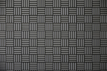 Gray tile wall with geometric pattern as background material