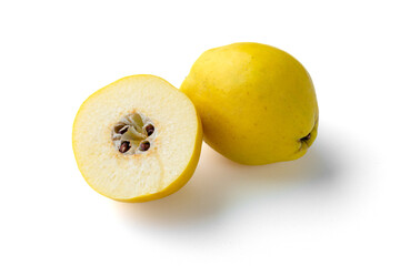 Fresh quince fruits with half isolated on a white background