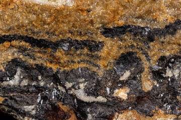 macro mineral fluorite stone on black background
