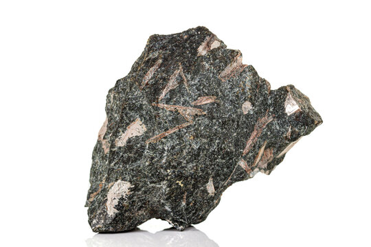 Macro stone mineral Diopside Calcite Magnetite on a white background