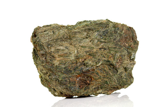 Macro stone mineral Diopside Calcite Magnetite on a white background