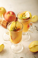 Warm apple autumn drink with cinnamon