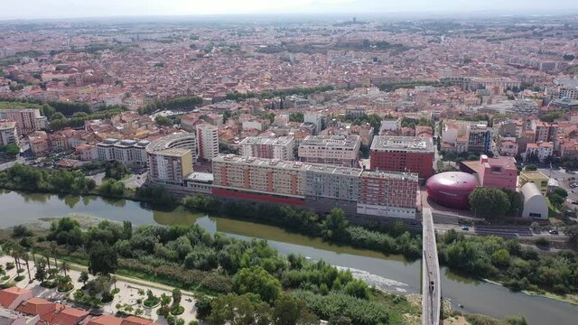 Bird's eye view of Perpignan, France. Residential buildings and Tet River visible from above. 