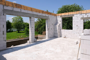 Construction of a new house from a foam block at a summer cottage.