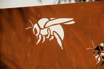 Corten wall with laser cut bee