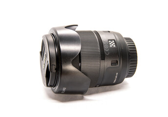 Lens for a professional camera with aperture on a white background