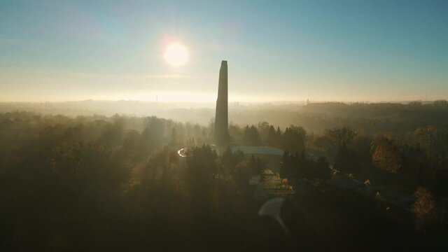 Dawn with fog at the Glory Memorial. Autumn city of Rivne Ukraine. Aerial shot
