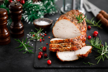 Christmas turkey ham roasted for festive dinner on black background