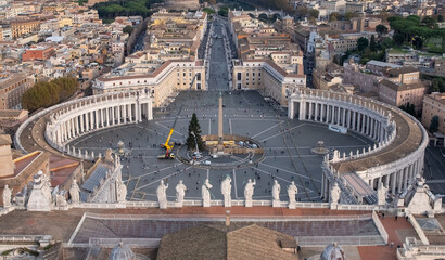 Establishment of Christmas tree near ancient Egyptian obelisk, at the center of St. Peter's Square, a large plaza in front of Saint Peter's Basilica in the Vatican City, the papal enclave inside Rome - obrazy, fototapety, plakaty