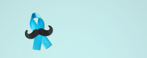 Brigh blue ribbon and mustache shape symbol of prostate cancer awareness