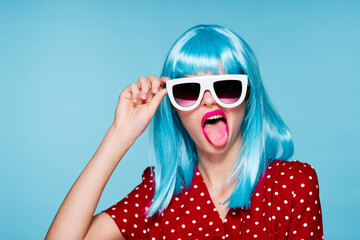 pretty woman fashion blue wig posing sunglasses