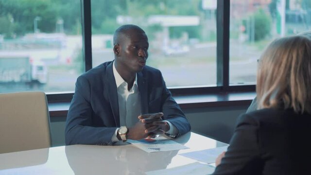 business workgroup team with african man leader discuss