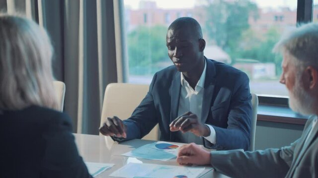 business workgroup team with african man leader discuss