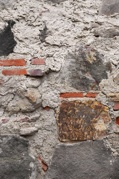 Pared de piedra, ladrillo. Fondo con textura vertical.