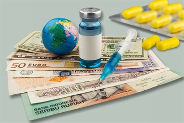 US dollars and oral drug against Covid-19. Concept of purchasing, buying or roll out tablets