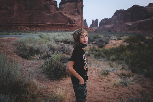 Road Trip During Covid: Boy With Mask in Arches National Park.