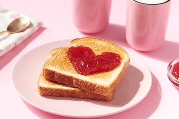 Toast with Heart Shaped Jam and Coffee on Pink