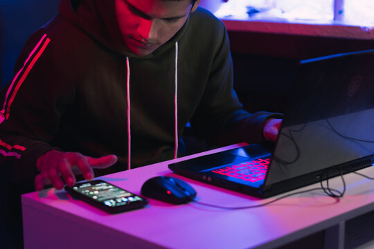 Young man doing a live video game sharing online.