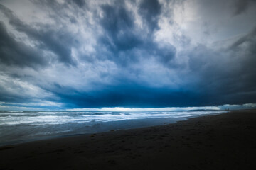 Long exposure shot of dark stormy clouds over the sea in Enoshima