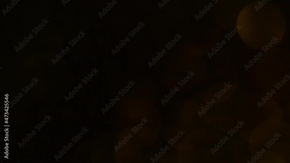 Wall mural looped movement of golden yellow bokeh diagonally from bottom to top. hd loop light leak. smooth pla