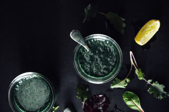 Food: Green smoothie with wild herbs and lettuce