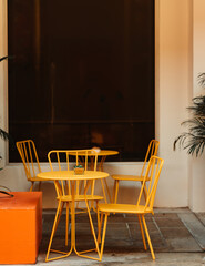 table and chairs cafe restaurants yellow restaurant 