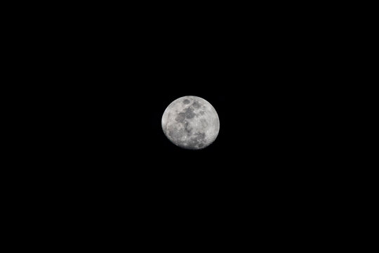 waxing gibbous of moon isolated black in night sky