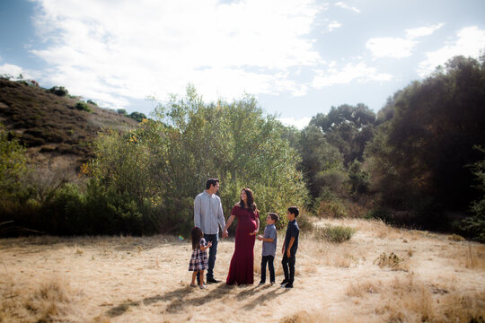 Family of Five Standing in Field in San Diego