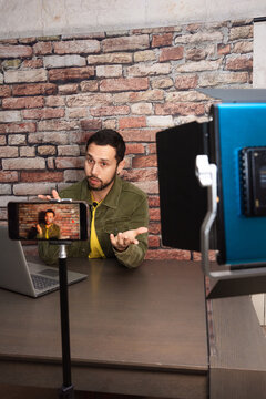 Man recording a video tutorial for social media