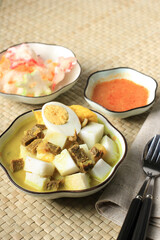 Lontong Kari Sapi, Ketupat with Beef Curry Soup. This is a Traditional Food, typically of Bandung, Indonesia.