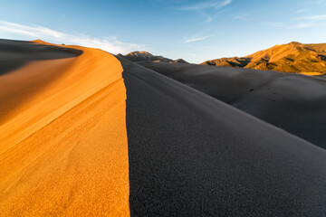 Last sunlight hits the sand dunes, Colorado