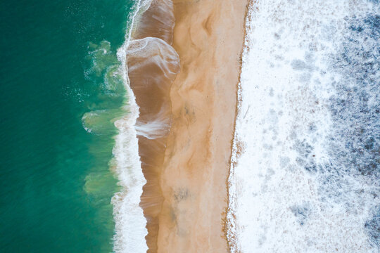 Ocean on a Sandy Beach Shoreline from Aerial Drone