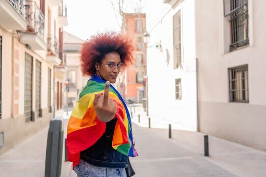 activist woman with gay pride flag