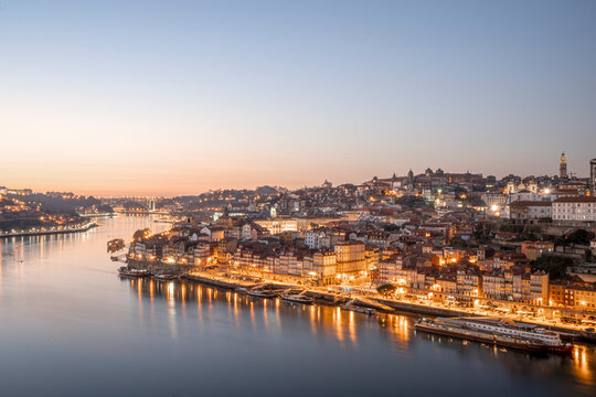 View of the Unesco Porto site at sunset with city light on, overlookin