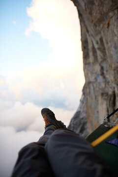 Man on a difficult rock climb called Odyssee on the Eiger North Face