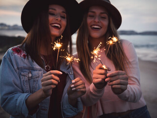 Girls Celebrating friendship on the beach
