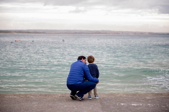 Father and son talking. Relationship between fathers and children.