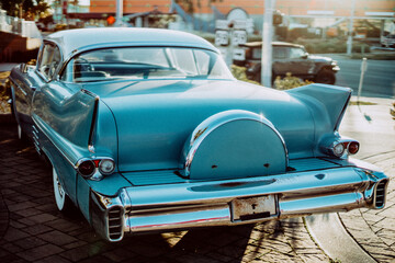 Beautiful vintage Cadillac parked at the sunset