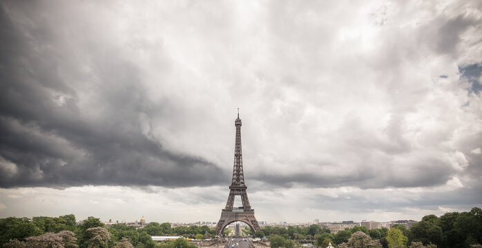 Eiffel Tower against dramatic sky