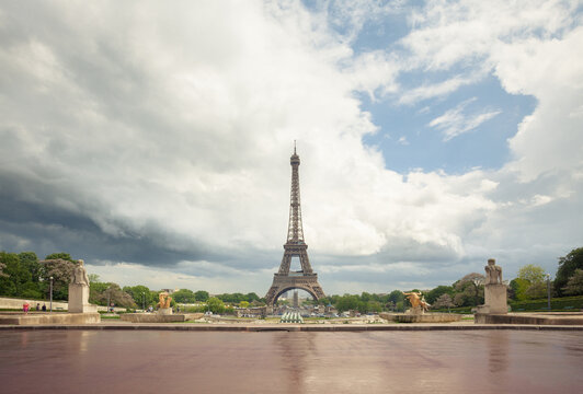 Eiffel Tower against dramatic sky