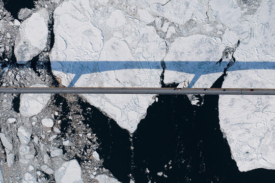 Aerial over Long Bridge and Ice Filled Bay in Canada