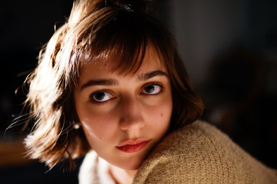 night portrait of a brown-eyed woman