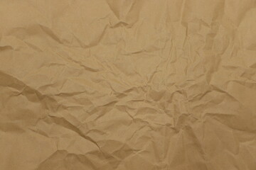 Crumpled brown paper surface texture