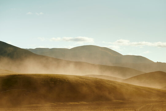 Dust storm over hills in nature
