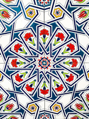 traditional Uzbek pattern on the ceramic tile on the wall of the mosque, seamless background	