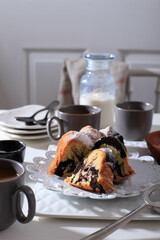 Marble Cake with Coffee with Powder Sugar and Kitchen Vintage Utensil, White Bakery Concept