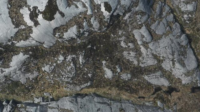 Top down drone shot of indescribable landscape in Norway.
