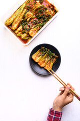 Kimchi bok choy and mustard green in food container ready to eating on white background, Homemade...