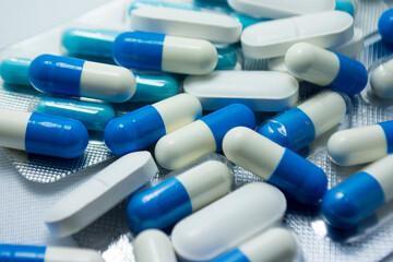 Medication in blue and white pills
