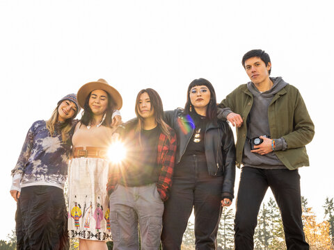 Young Indigenous friends hanging out outdoors